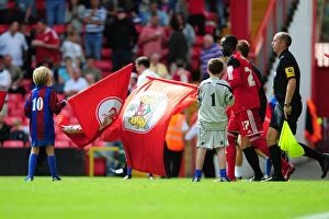 Images Dated 25th August 2012: Bristol City Flag Bearers at Ashton Gate Stadium during Championship Match