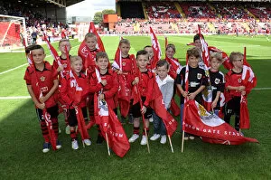 Images Dated 16th August 2014: Bristol City Flagbearers in Action at Ashton Gate: Bristol City vs Colchester United