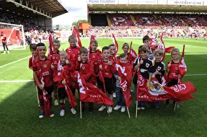 Bristol City V Colchester United Prints: Bristol City Flagbearers in Action: Sky Bet League One Match against Colchester United