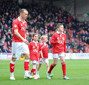 Bristol City Football Club: Mascots Accompany Aaron Wilbraham onto Ashton Gate Pitch vs Gillingham (140315)