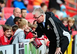 Bristol City Football Club: David Lloyd Engages with a Fan at Pre-Season Open Day, 2012
