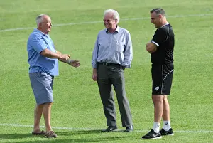 Bristol City Football Club: Directors and Coaches Discussing Pre-Season Strategies