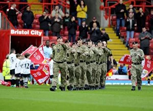 Images Dated 9th November 2013: Bristol City Football Club: FA Cup First Round - Soldiers Lead Team Out Against Dagenham