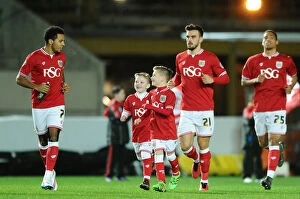 Images Dated 23rd February 2016: Bristol City Football Club: Korey Smith and Mascots Lead Out Team vs. Brighton, 2016