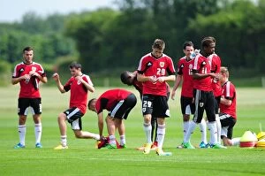 Images Dated 27th June 2013: Bristol City Football Squad at Pre-Season Training: A Moment of Relaxation