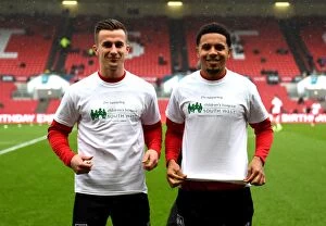 Images Dated 4th March 2017: Bristol City Footballers Joe Bryan and Korey Smith Display Children's Hospice South West Support