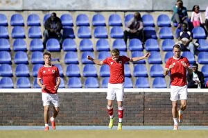 Images Dated 21st July 2014: Bristol City Footballers Joe Bryan, Wes Burns, and Aaron Wilbraham Warm Up Ahead of Extension