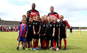 The Grove Prints: Bristol City Footballers Jonathan Kodjia and Lee Tomlin Engage with Young Fans at Hengrove Athletic Pre-season Match
