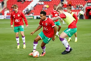 Bristol City Footballers Korey Smith and Aden Flint Warm Up Ahead of Fleetwood Town Match, 2014