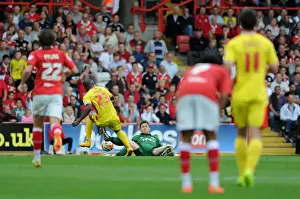 Bristol City Goalkeeper Frank Fielding Tackles Benik Afobe of MK Dons in Sky Bet League One Clash