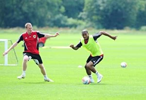 Images Dated 4th July 2011: Bristol City: Intense Training Battle between Marvin Elliott and David Clarkson