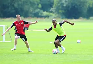 Framed Print : Bristol City: Intense Training Battle between Marvin Elliott and David Clarkson