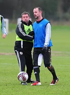 Training 10-1-12 Collection: Bristol City: Intense Training Clash between Captain Carey and Assistant Manager Docherty