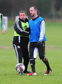 Training 10-1-12 Prints: Bristol City: Intense Training Clash between Captain Carey and Assistant Manager Docherty