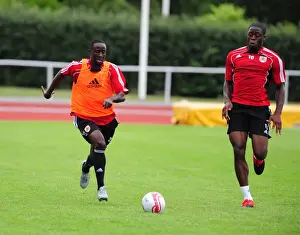 Training Prints: Bristol City: Intense Training Moment - Albert Adomah and John Akinde Compete for the Ball