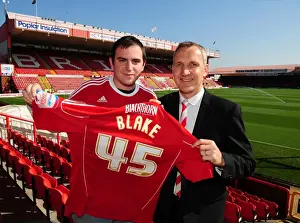 Bristol City Manager Keith Milken Presents NPower Super Fan Dan Blake with a Team Shirt (Bristol City v Burnley)