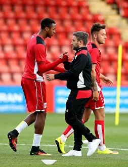 Images Dated 25th July 2016: Bristol City Manager Lee Johnson Shakes Hands with Jonathan Kodjia after Preseason Friendly vs