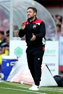 Images Dated 25th July 2016: Bristol City Manager Lee Johnson's Intense Focus During Cheltenham Town Match, July 2016