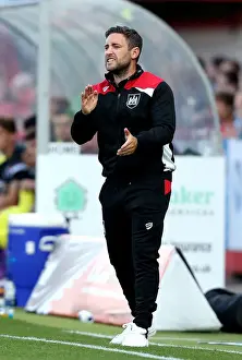 Framed Print : Bristol City Manager Lee Johnson's Intense Focus During Cheltenham Town Match, July 2016