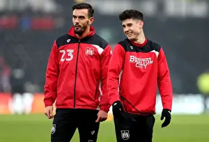 Derby County V Bristol City Prints: Bristol City: Marlon Pack and Callum O'Dowda Sharing a Joke Amidst Derby County Tension
