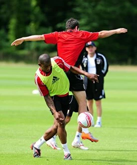 Images Dated 6th July 2010: Bristol City: Marvin Elliott and Ivan Sproule Lock Heads in Intense Aerial Training Battle