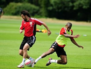 Images Dated 6th July 2010: Bristol City: Marvin Elliott and Paul Hartley in Intense Training Battle