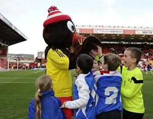 Bristol City V Gillingham Prints: Bristol City Mascot Scrumpy Delights Young Fans at Ashton Gate during Bristol City vs Gillingham Match