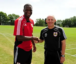 Bristol City New signing Kalifa Cisse with Bristol City Manager, Steve Coppell