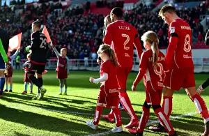 Bristol City Players and Mascots Kick Off Championship Match Against Cardiff City