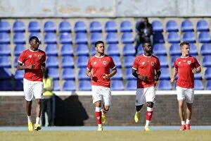 Images Dated 21st July 2014: Bristol City Players Warm Up Ahead of Extension Gunners Clash in Botswana, 2014