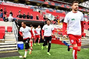 Images Dated 4th March 2017: Bristol City Players Warm Up in Children's Hospice South West Shirts vs Burton Albion (04/03/2017)