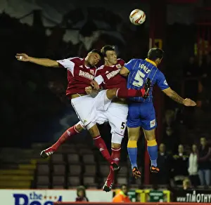Bristol City V Shrewsbury Town Prints: Bristol City Rivals Aden Flint and Derrick Williams Clash in Aerial Battle Against Shrewsbury Town