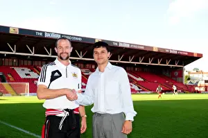 Bristol City U21s: Tim Kirk and Louis Carey Share a Moment after Match against Colchester United