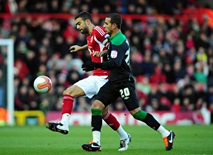 Bristol Citys Liam Fontaine battles for the ball