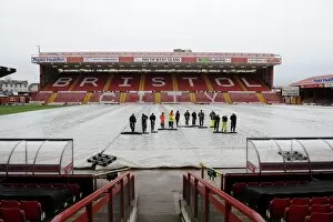 Images Dated 4th January 2014: Bristol City v Watford: FA Cup Third Round - Groundsmen Prepare the Pitch