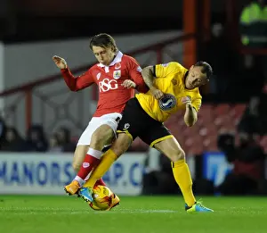 Bristol City vs AFC Wimbledon: Luke Freeman Tackled by Barry Fuller in Johnstone's Paint Trophy Clash