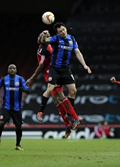 Bristol City V Barnsley Prints: Bristol City vs Barnsley: Marvin Elliott and Jim McNulty Battle for Aerial Supremacy in Npower Championship Clash