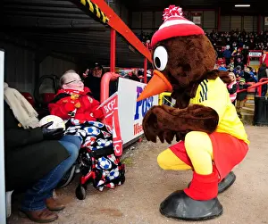 Framed Print : Bristol City vs Barnsley: A Heartwarming Moment Between Scrumpy and a Young Fan Framed Print : Bristol City vs Barnsley: A Heartwarming Moment Between Scrumpy and a Young Fan