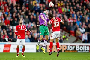 Barnsley V Bristol City Prints: Bristol City vs Barnsley: Intense Aerial Battle Between Aaron Wilbraham and James Bailey
