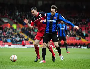 Bristol City vs Barnsley: Intense Battle for the Ball between Brendan Moloney and James O'Brien