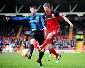 Images Dated 23rd February 2013: Bristol City vs Barnsley: Pearson vs Delap Clash in Npower Championship