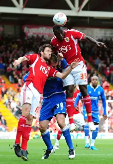 Bristol City V Birmingham City Prints: Bristol City vs Birmingham City: Damion Stewart and Cole Skuse Battle for High Ball in Championship Match