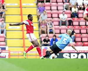 Bristol City V Bradford City Prints: Bristol City vs Bradford City: Jay Emmanuel-Thomas vs Andrew Davies - Intense Battle on the Field