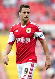 Bristol City vs Bradford City: Sam Baldock's Determined Performance at Ashton Gate, August 3, 2013 (Football Image)