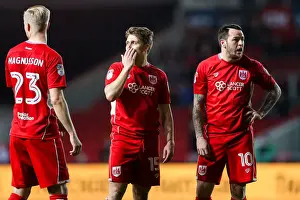 Bristol City V Brentford Prints: Bristol City vs Brentford: Luke Freeman and Lee Tomlin in Action at Ashton Gate Stadium
