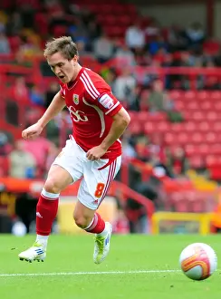 Bristol City vs Brighton: Neil Kilkenny in Championship Action at Ashton Gate Stadium (September 10, 2011)