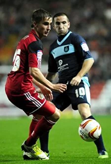 Images Dated 23rd October 2012: Bristol City vs Burnley: A Championship Showdown at Ashton Gate Stadium - Joe Bryan vs Martin