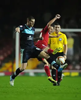 Bristol City vs Burnley: Intense Battle for the Ball between Jody Morris and Chris McCann