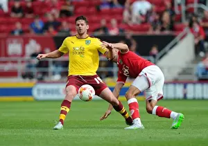 Burnley V Bristol City Prints: Bristol City vs Burnley: Intense Battle Between Derrick Williams and Lukas Jutkiewicz on the Field