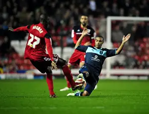 Bristol City vs Burnley: Intense Moment as Junior Stanislas Tackles Albert Adomah